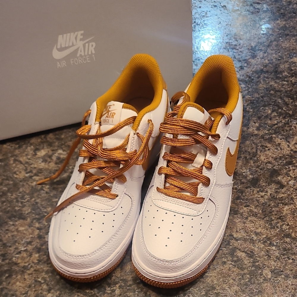 Nike Air Force 1 White and Gold Sneakers